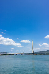 Fototapeta premium Taiwan tamsui Danjiang Bridge in Taipei city under clear blue sky