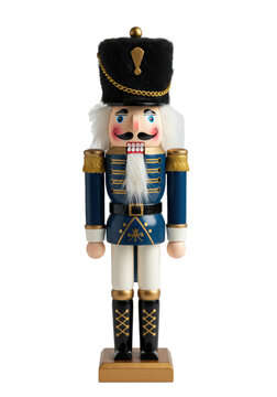 A hyper-detailed wooden nutcracker soldier in a prussian blue uniform and black shako hat, standing rigidly against a white studio background with copy space. Traditional christmas collectible concept