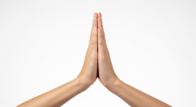 Hands positioned together in a respectful gesture of gratitude and thanks, isolated on a clean, bright, and simple white studio background, clasped, gratitude, clean