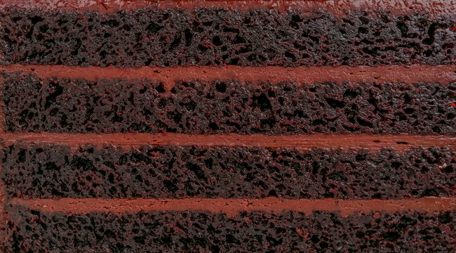Close up four layers of chocolate cake