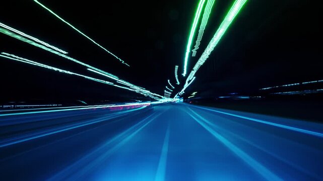 Nighttime Drive Through Illuminated Road Lights With Motion Blur Effects. Hyperlapse Road Trip. Driving Along a Highway at Night Featuring Bright Streetlights Overhead and Motion Blur Effects