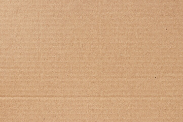 Fototapeta premium Brown cardboard sheet abstract background, texture of recycle paper box in old vintage pattern for design art work.