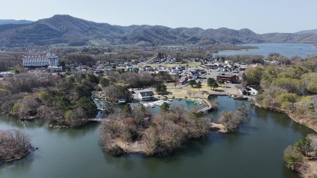 HOKKAIDO, JAPAN.Natural park with scenic lake and volcanic peaks April 26 2026