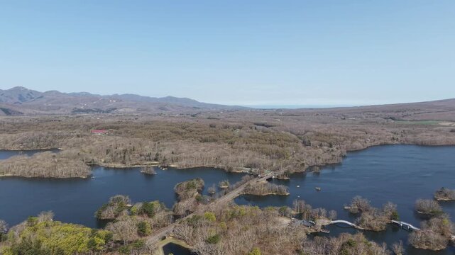 HOKKAIDO, JAPAN.Natural park with scenic lake and volcanic peaks April 26 2026