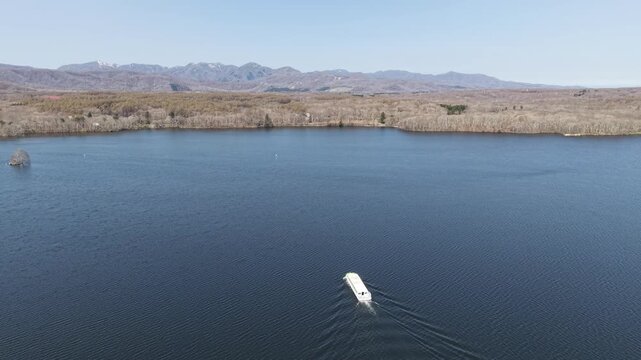 HOKKAIDO, JAPAN.Natural park with scenic lake and volcanic peaks April 26 2026