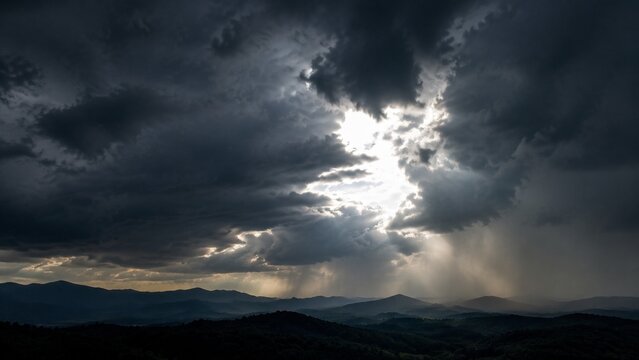 Dramatic Storm Clouds With Sunlight Breaking Through