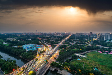 Obraz premium Beijing's Dusk City Transportation Hub: A Modern Urban Three-Dimensional Transportation System