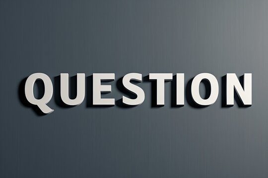 ダークグレーの背景の前にあるQUESTIONの立体的なアルファベット文字　