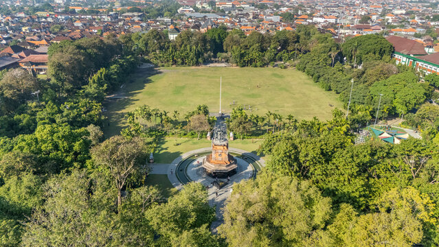 Aerial drone view of Bajra Sandhi Monument and Lapangan Puputan park in Denpasar, Bali, Indonesia