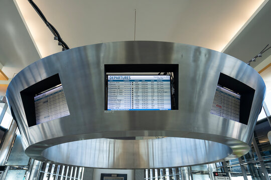Houston, TX, USA - Apr 8, 2025: Departures boards at George Bush Intercontinental Airport, the main international airport in Houston, Texas.