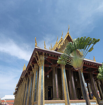 Low angle view of Phra Ubosot ordination hall with Chofa roof finials, Bangkok