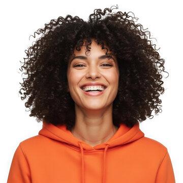 Smiling woman with curly hair in orange hoodie