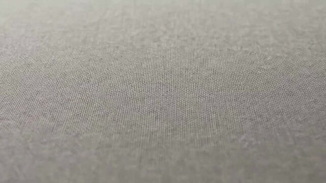 Close-up of Smooth Grey Fabric Texture for Background or Design
