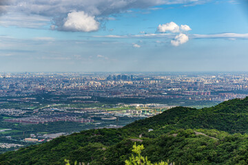 Obraz premium Panoramic Long-Lens View of Central TV Tower and Lize CBD from Western Hills, Beijing