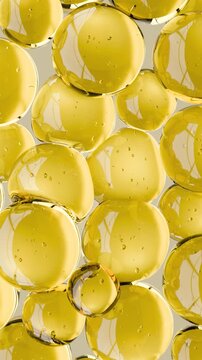 3D golden gel texture with air bubbles on a white background, skin care serum or cosmetics essence. Beauty, wellness, or spa-themed content. Natural cooking oil, motor oil.	