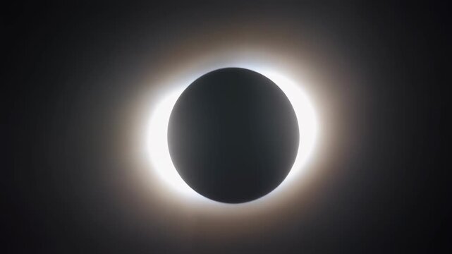 Spectacular Total Solar Eclipse Corona Visible in Dark Sky.