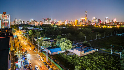 Obraz premium The night view of Beijing's CBD (Guomao District) skyline, blending urban prosperity with everyday life.