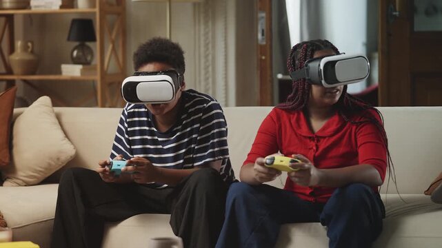 African American children in VR headsets playing video games with controllers