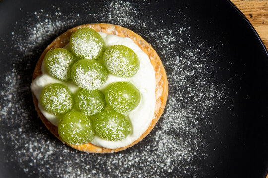 Green grape slice cake on a plate