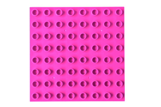 Top view Bright pink or magenta Square lego duplo base plate toy block brick isolated on white