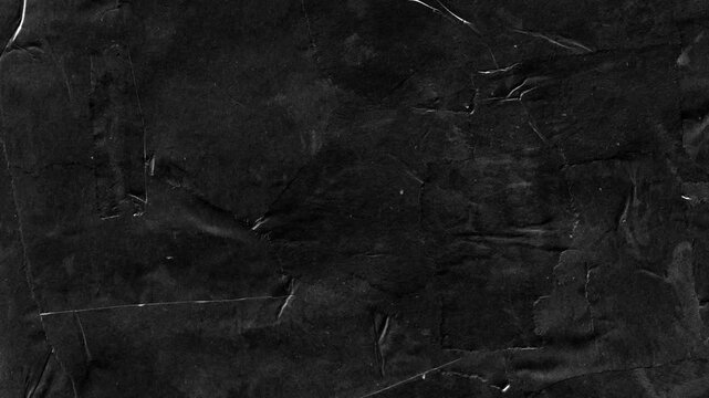 Seamless looping black crumpled paper background texture.Video effect 4k