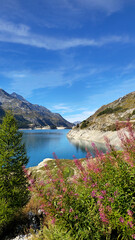 Fototapeta premium Lake Lac du Chevril in the mountain landscape, French Alps, Tignes, Savoie, France, Europe.