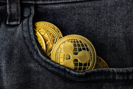 Ripple, Ethereum y criptomonedas variadas en el bolsillo de los vaqueros; ahorros diversificados en activos digitales para el sector fintech y la inversi&oacute;n