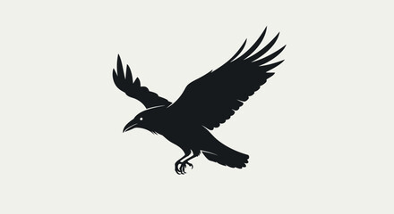 Fototapeta premium Silhouette of a raven soaring against a plain background, wings spread