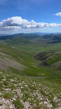 High angle view of Castelluccio di Norcia valley in spring, Sibillini mountains, Italy