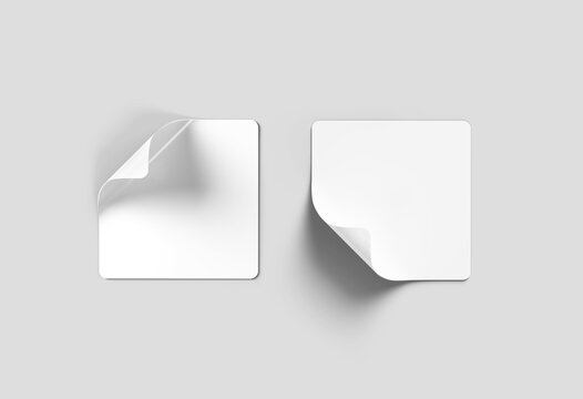 Blank squared stickers isolated on grey. Square labels mockup. 3D rendering