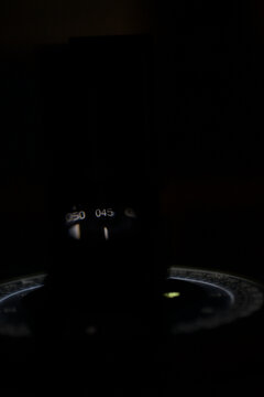 Closeup view of gyro compass at night