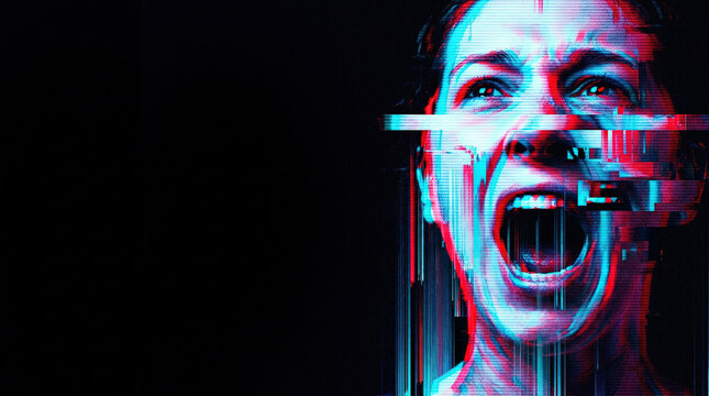 Screaming face distorted by digital glitch effects. Concept of anxiety, panic, and mental breakdown