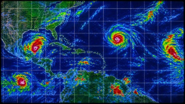 A satellite image depicting multiple hurricanes in the Atlantic, highlighting their formations and paths across the Caribbean and approaching the southeastern U.S.