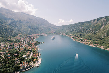 Fototapeta premium Aerial View of Kotor Bay with Cruise Ship and Mountains