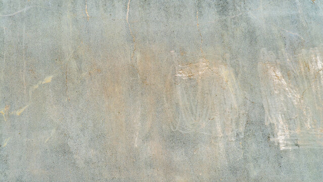 Weathered Pale Blue Gray Concrete Wall with White Scuff Marks