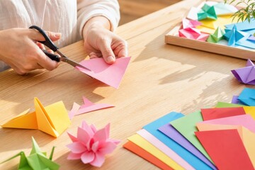 Hands of adult cutting pink paper with scissors at wooden table, creating colorful origami art in bright sunny room, peaceful mindful creative hobby concept, close-up