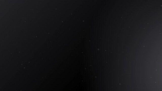Cinematic organic dust particles floating naturally across a dark backdrop. Dust particles floating black background cinematic atmospheric overlay for video editing and motion graphics.