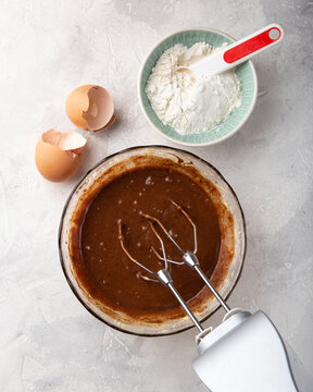 Mixing food ingredients for chocolate cake