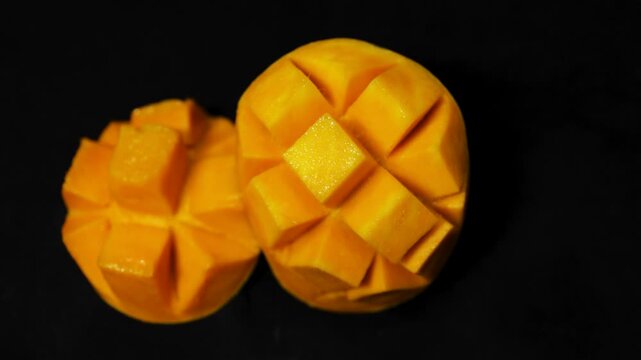 healthy ripe mango slices arranged creatively for tropical fruit presentation