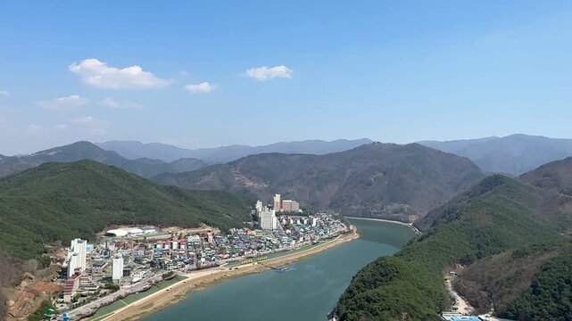 High-angle landscape footage featuring river scenery, and mountainous terrain in Danyang, South Korea.