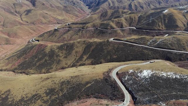 Aerial Drone View of Winding Mountain Road in the Tibetan Himalayas