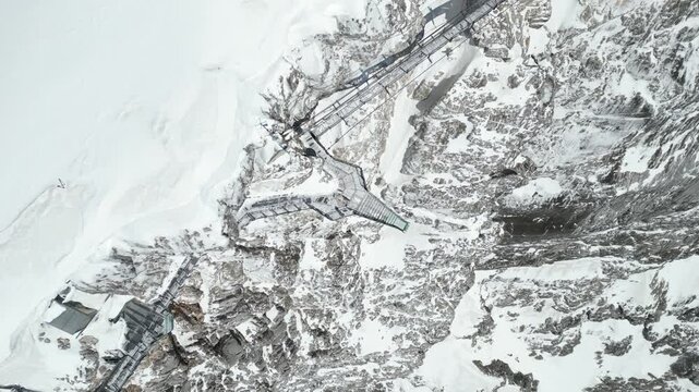 Cinematic Drone Footage of Alpine Glacier and Gondola Station &ndash; Snow Covered Mountain Landscape
