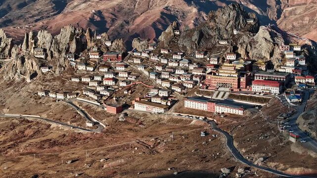Hyperlapse Drone Flight Over Zizhu Monastery Clinging to Cliffs in Eastern Tibet