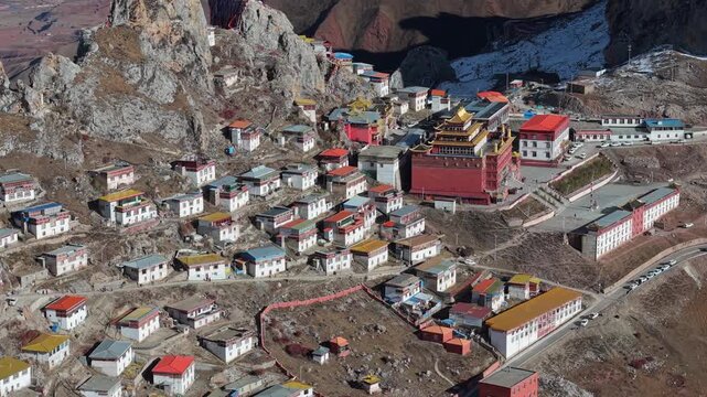 Aerial Drone View of Zizhu Monastery (Tsudrug temple) Nestled in Rocky Tibetan Mountains