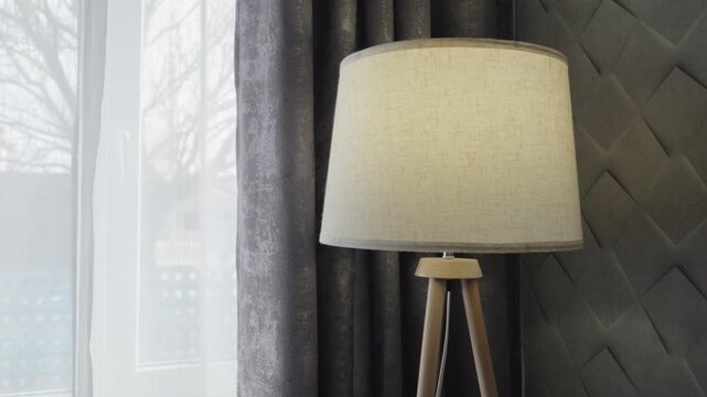 Floor Lamp Turning On in Cozy Modern Interior by Window