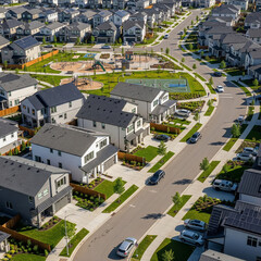 Fototapeta premium Aerial view of modern residential neighborhood with new houses