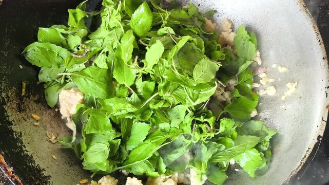 Cooking Stir-fried minced chicken with holy  basil