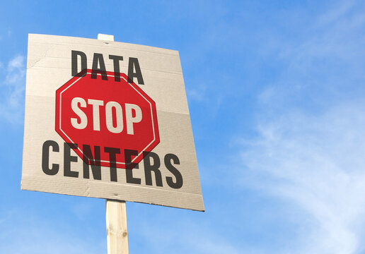 This sign calls for a halt to data centers.