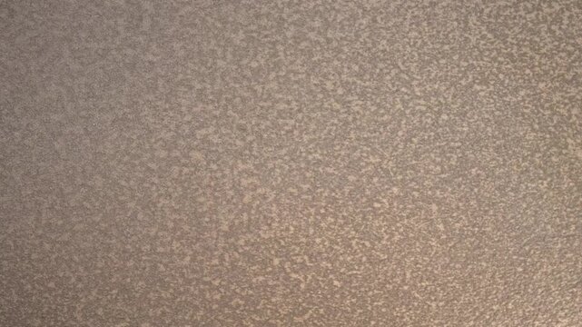 Slow Pan Across Bronze Metallic Texture Background in 4K