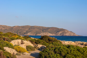 Mediterranean coastal hiking trail with sea views in Crete, Greece © Annika
